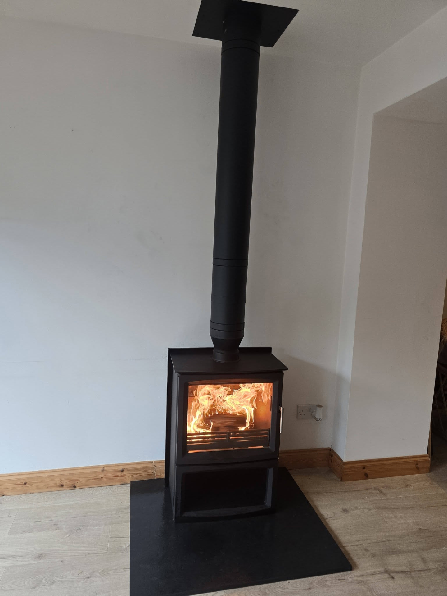 Replacement stove rope and glass fitted during a service at a modern holiday home — Chimney Sweeping Certificates in Callander, Stirlingshire