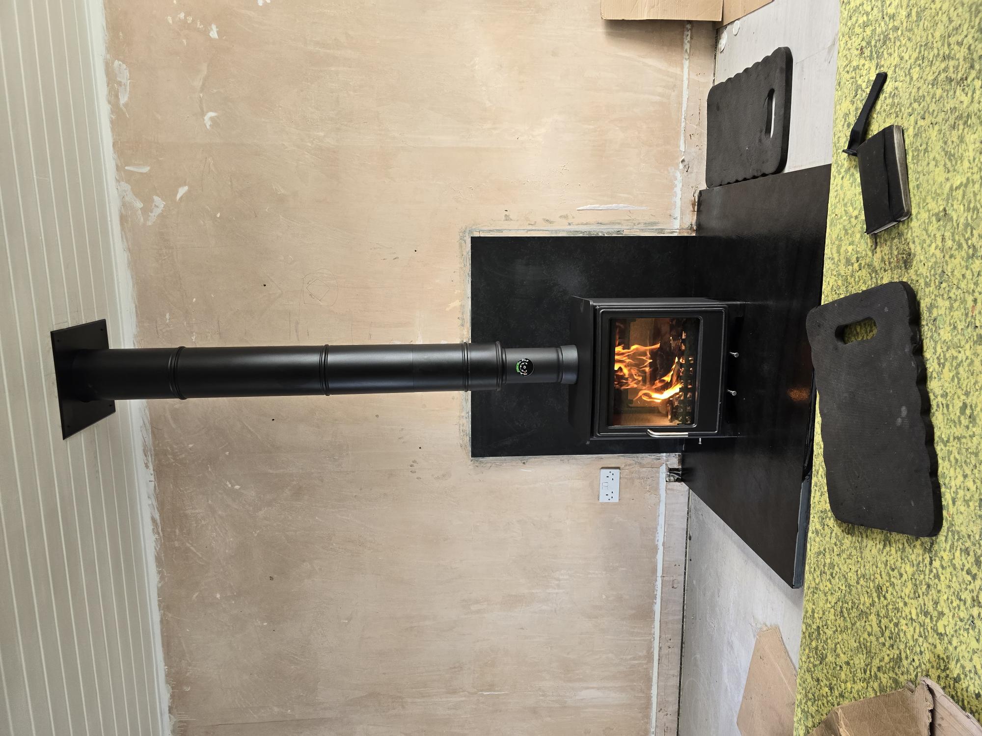 Twin wall flue fitted on gable wall