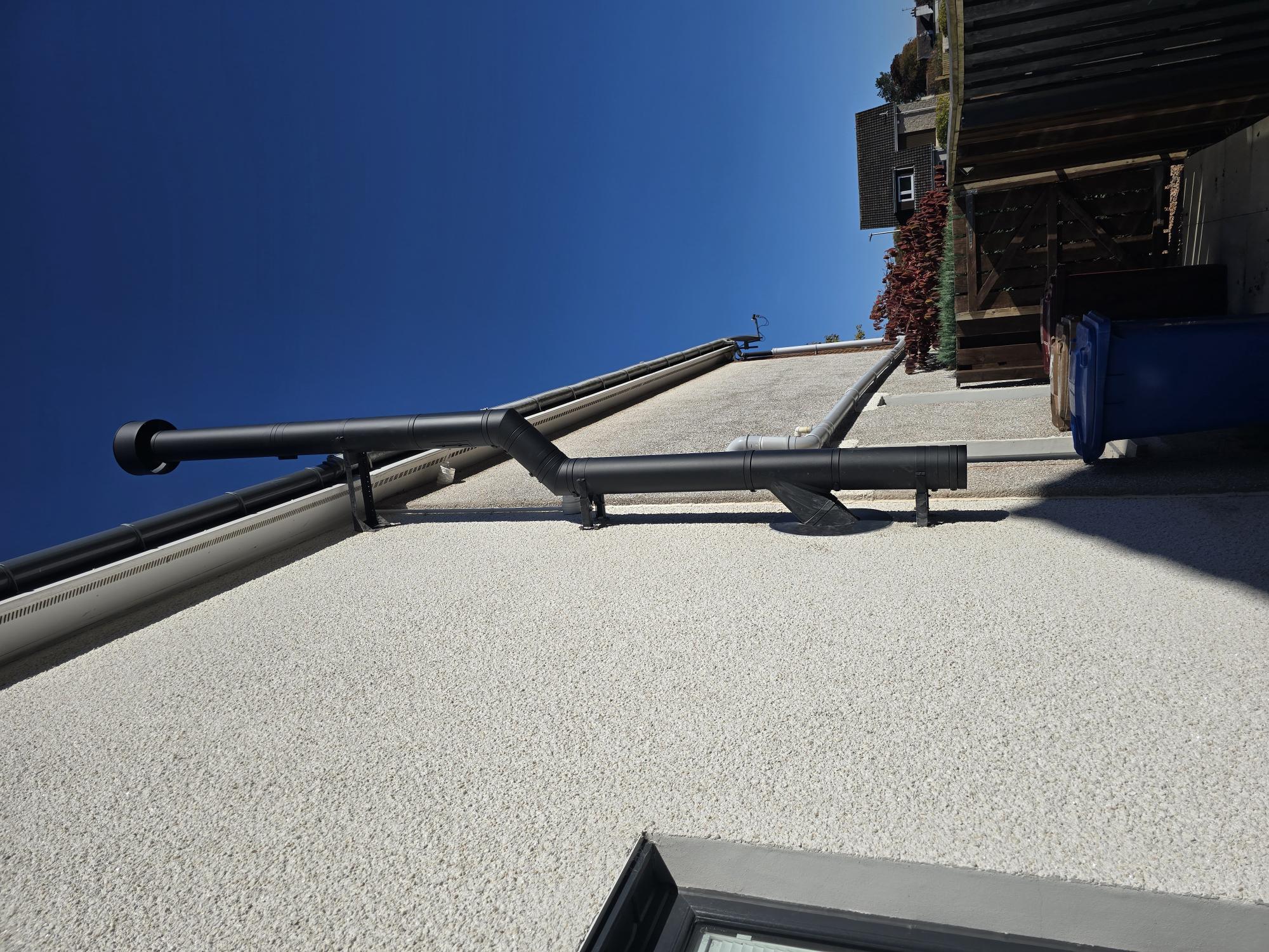 Twin wall chimney installation through roof