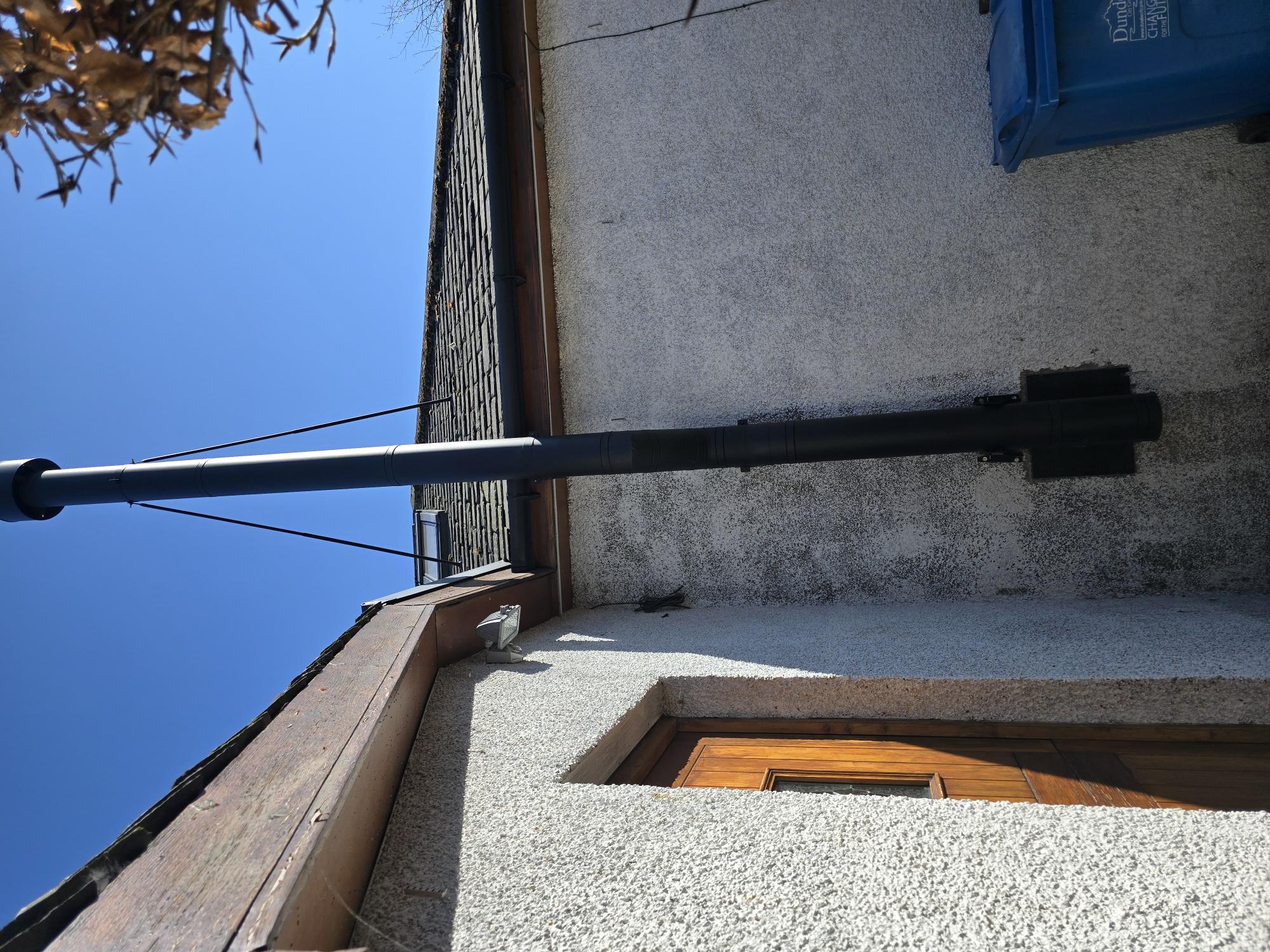 Twin wall chimney with rain cowl and access panel