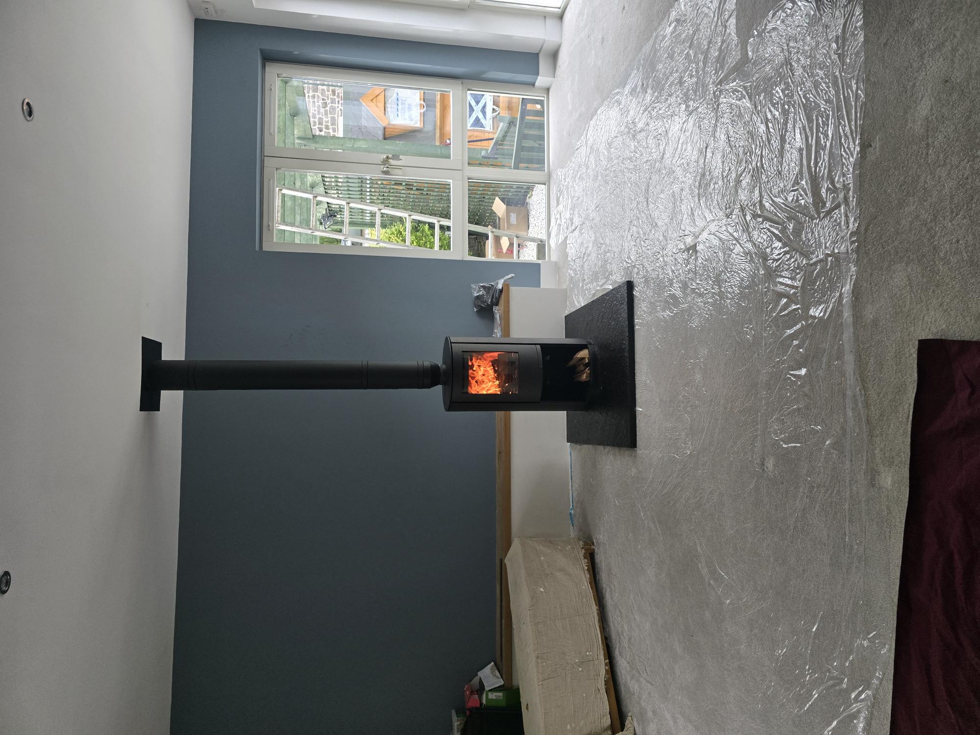 Twin wall flue installation on property exterior