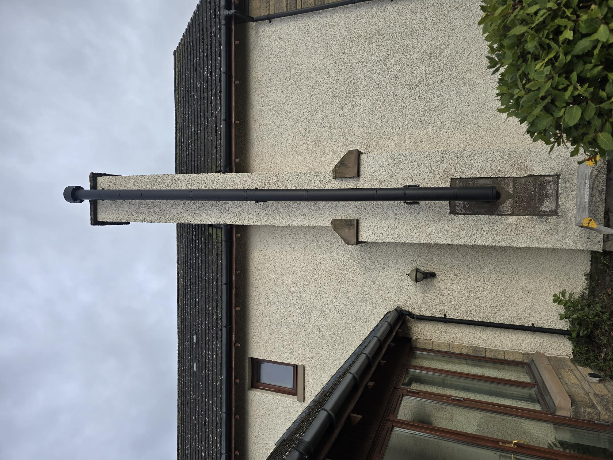 Completed twin wall chimney system on residential property